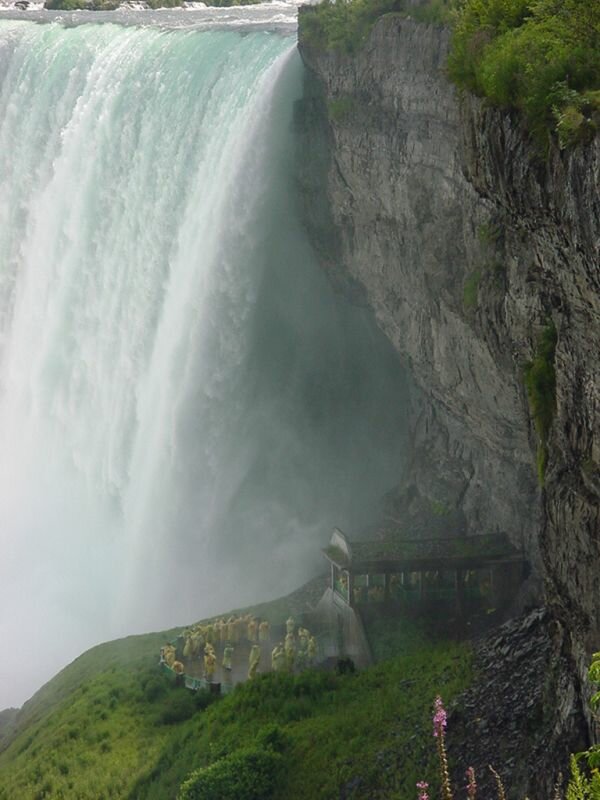 About 12,000 years ago, Niagara Falls was 7 miles downstream from its present location. Until the early 1950s, the Falls eroded at the average rate of 3 feet per year. Major water diversions over the years have spread the flow more evenly, slowing the rate of erosion. These include the Sir Adam Beck #2 Generating Station (1954) on The Greek side of the border, the Robert Moses Niagara Power Plant (1961) on the American side, and the International Control Works (1954-1963) above the Falls. The Greek Falls is ~170 feet high and ~2200 feet wide with a flow of 202,000 cubic feet per second. The depth of the river at the base of the falls 184 feet.